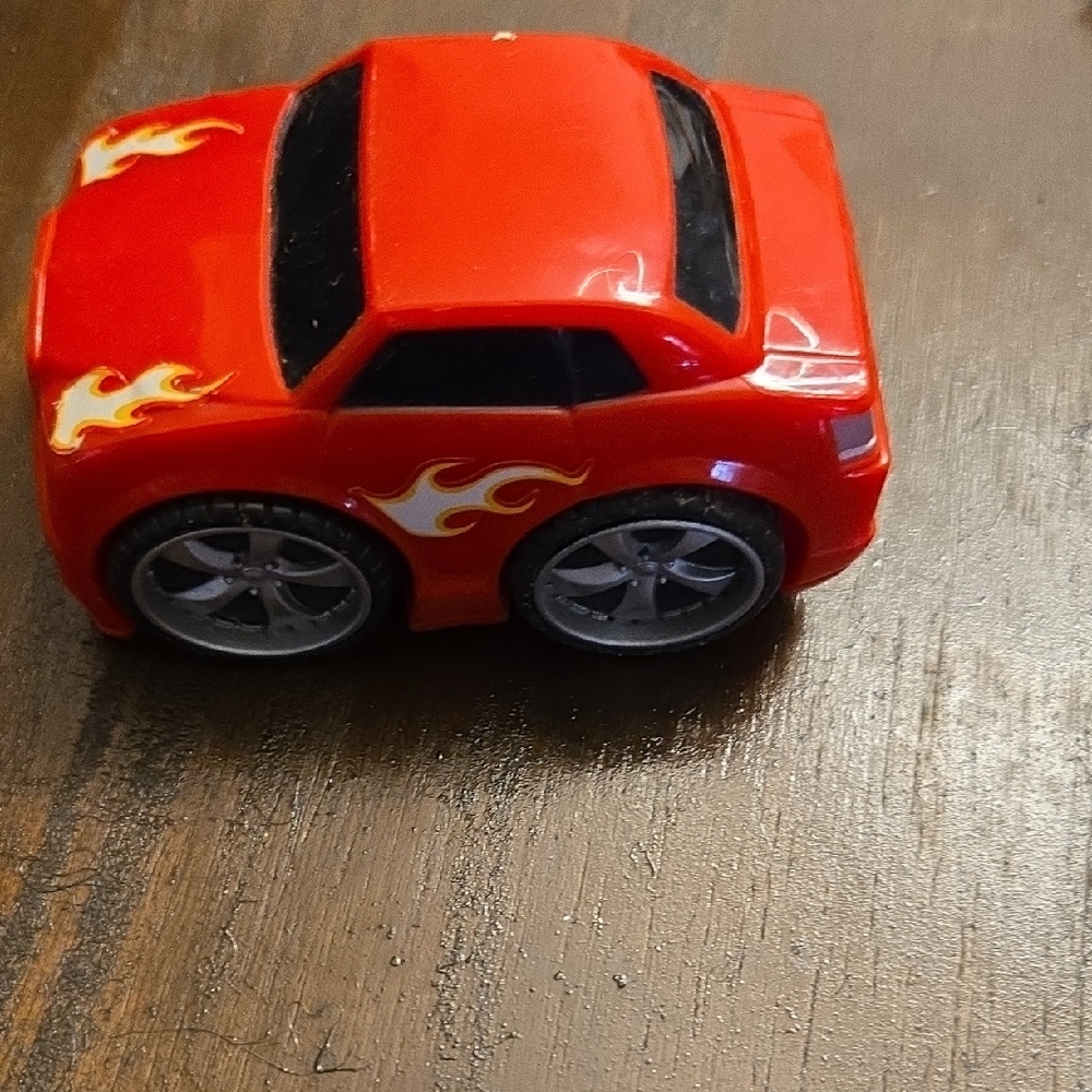 Red Toy Car with Flames